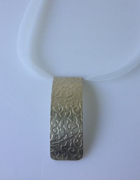 Kowhaiwhai silver pendant